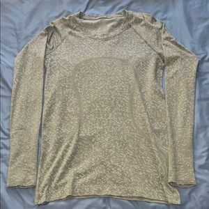 lululemon athletica Long Sleeve Top in green. Swiftly tech.
